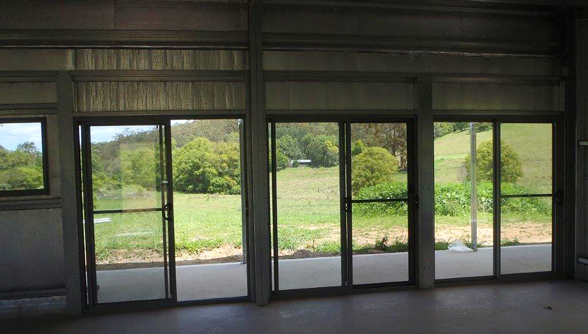 Sliding doors seen from the inside of a shed