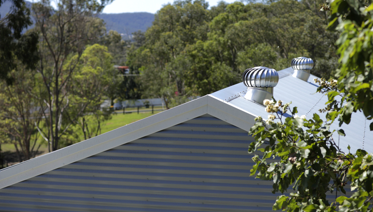 Corrugated shed roof featuring whirlybirds