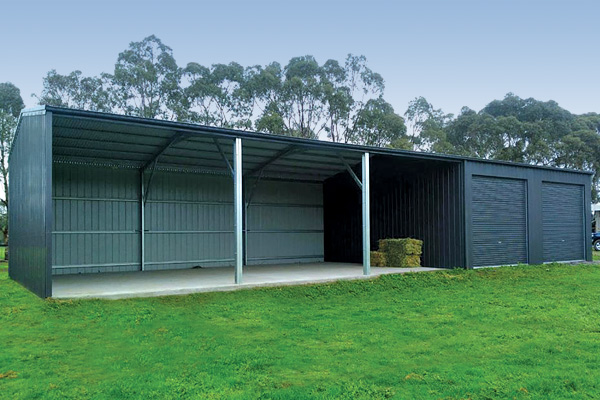 Farm shed with three open bay and two enclosed bay in COLORBOND Monument on walls, doors and trim